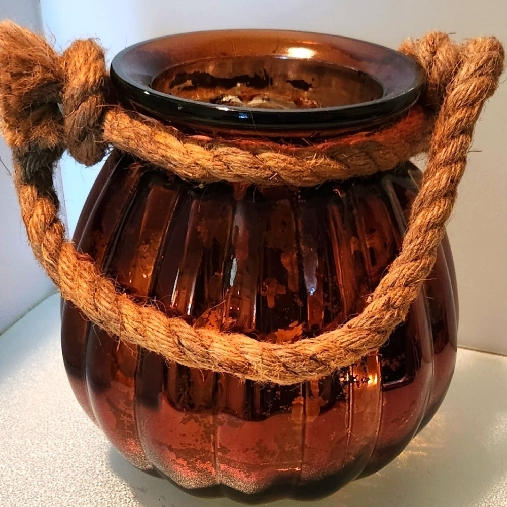 Glass iridescent orange pumpkin shaped fall vase with rustic rope detail handle